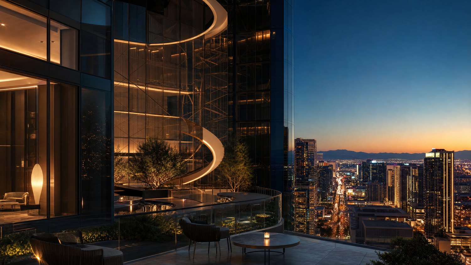 A sleek contemporary resort terrace overlooking a city boulevard at dusk.